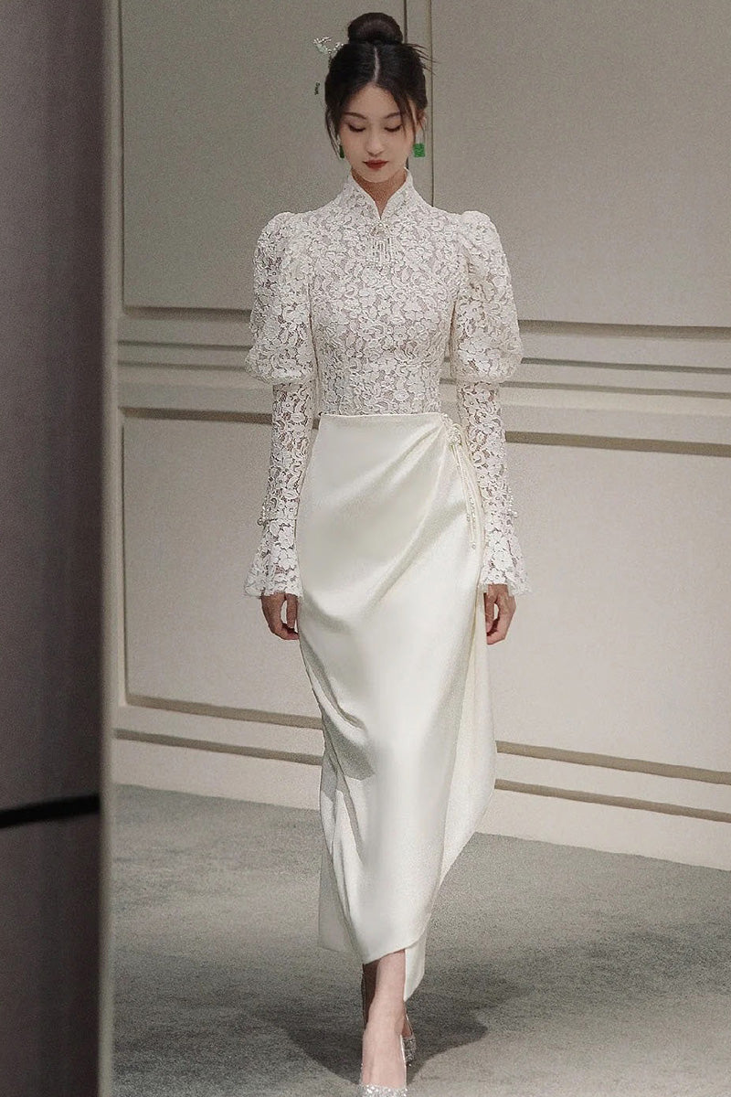 Traditional Chinese white cheongsam wedding dress.