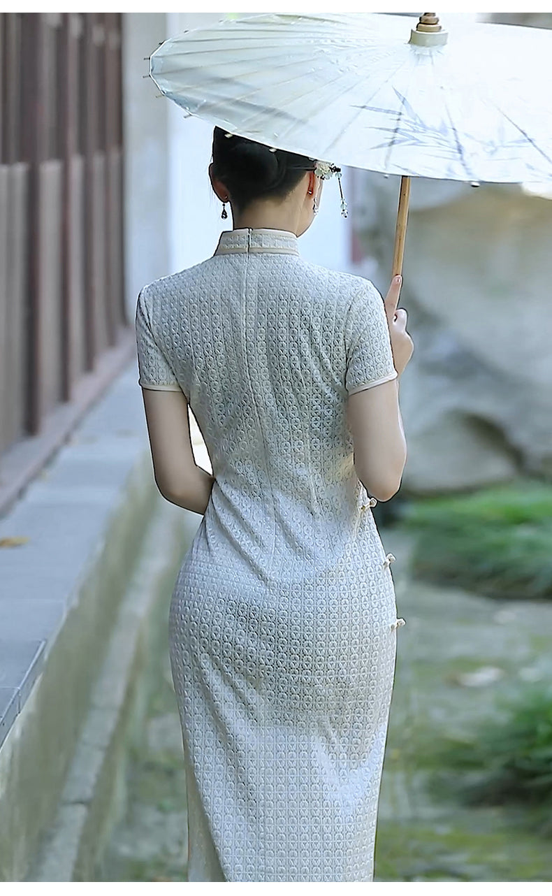 Traditional Chinese cheongsam dress. White cheongsam.