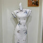 Luxury custom-made cheongsam gown.