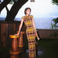 Modern qipao gown with a yellow plaid pattern