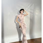 Modern qipao gown with a pink floral pattern