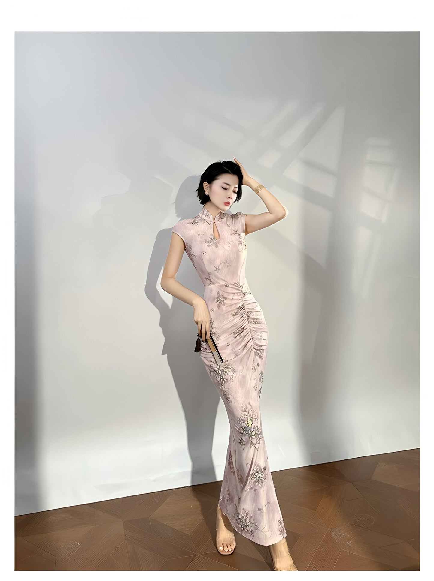 Modern qipao gown with a pink floral pattern