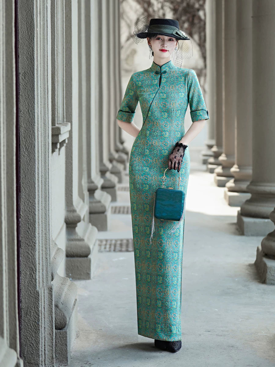 Tailoring a modern blue-green qipao gown for you.