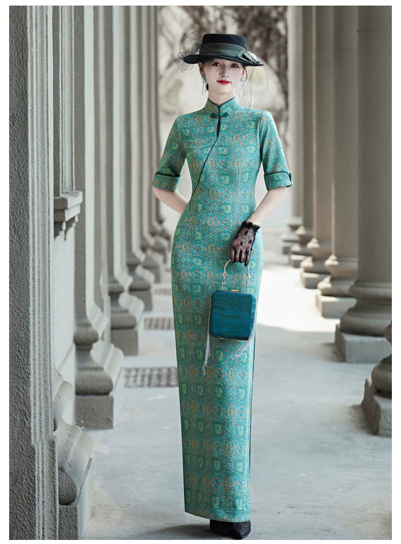 Tailoring a modern blue-green qipao gown for you.