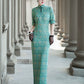 Tailoring a modern blue-green qipao gown for you.