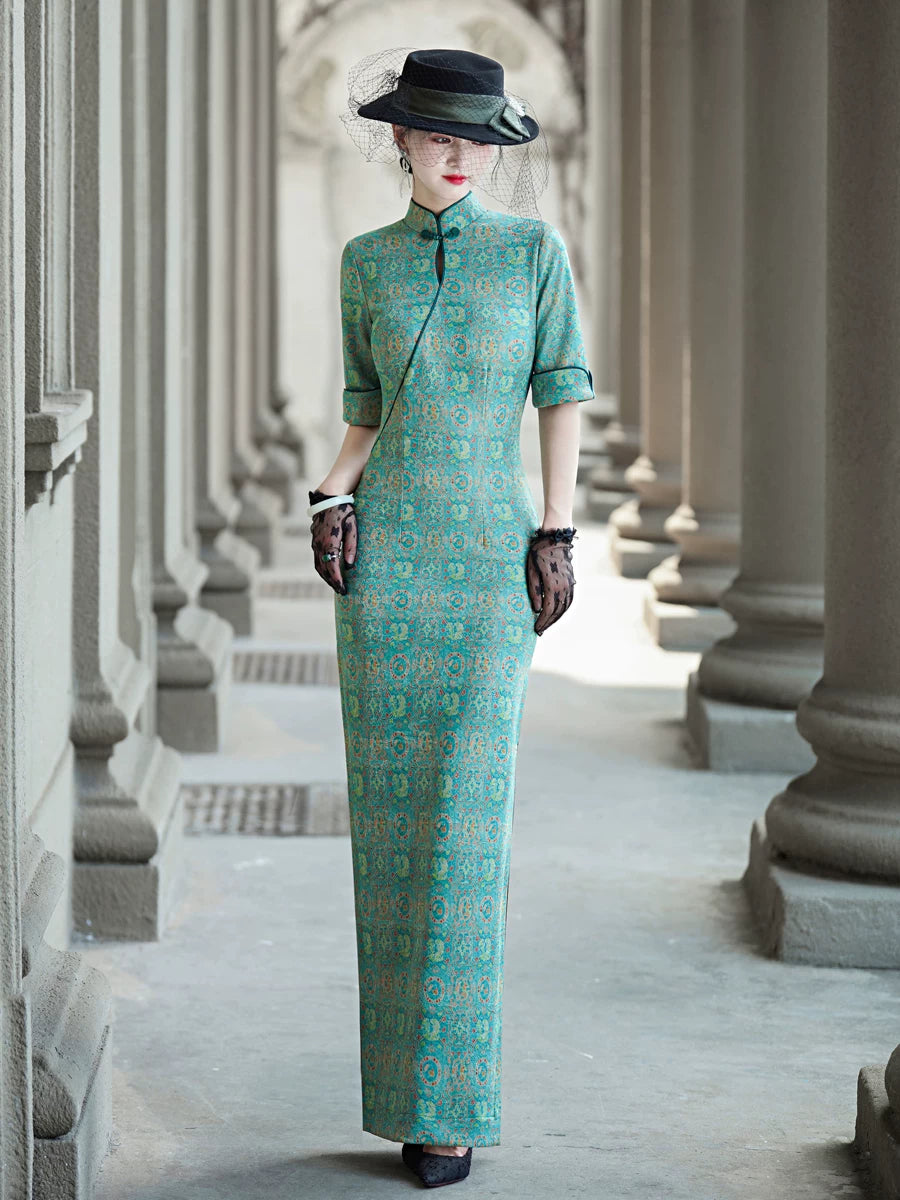 Tailoring a modern blue-green qipao gown for you.