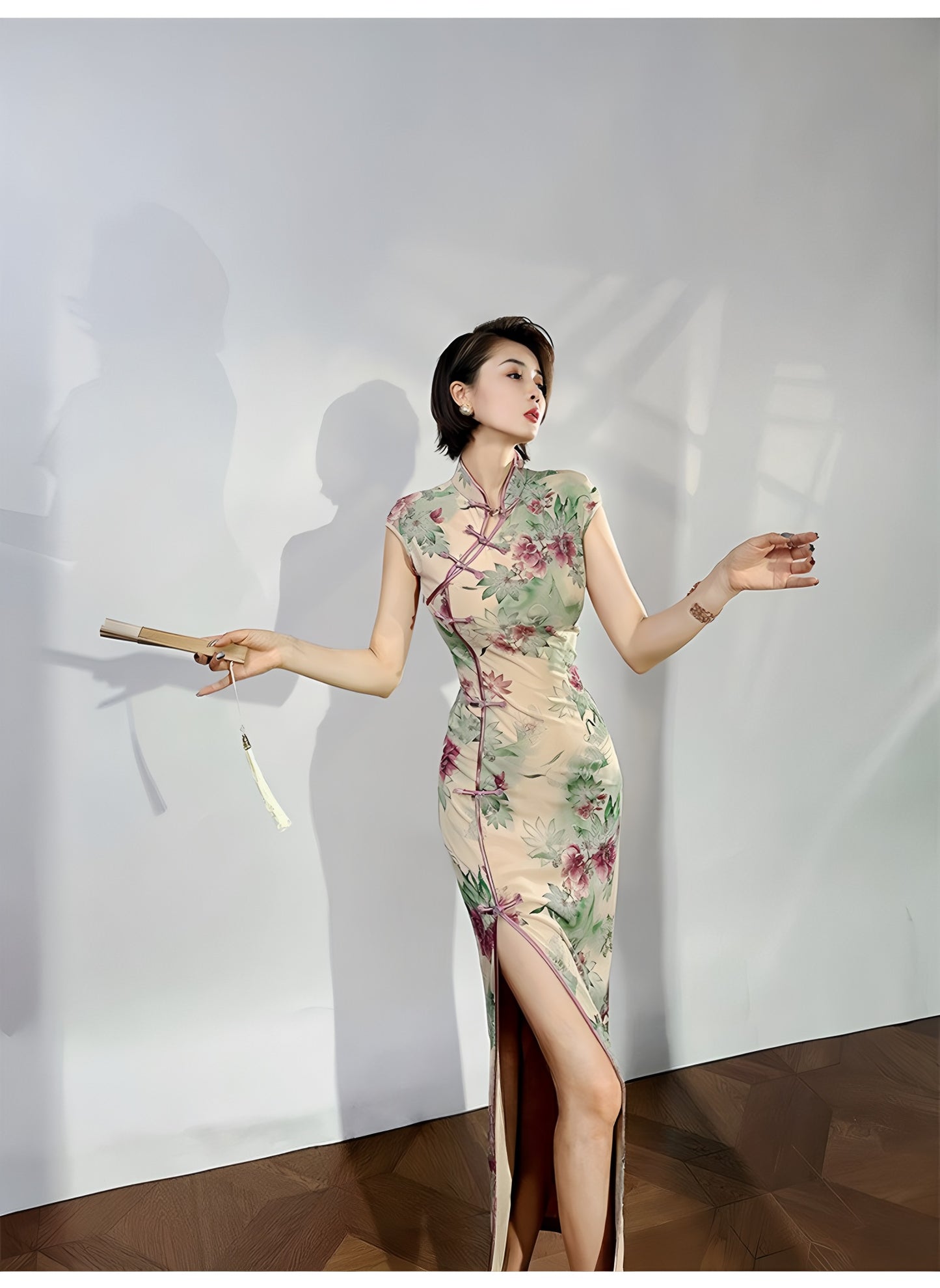 A cyan floral qipao gown for summer.