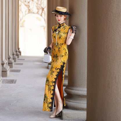 Yellow sleeveless modern qipao with a bamboo print.