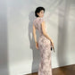 Modern qipao gown with a pink floral pattern