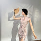 Modern qipao gown with a pink floral pattern