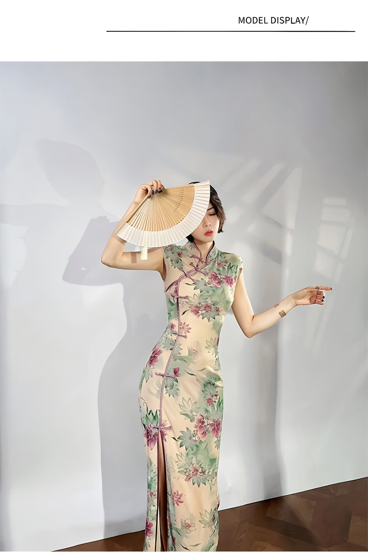 A cyan floral qipao gown for summer.