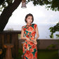 Modern qipao gown with red floral patterns