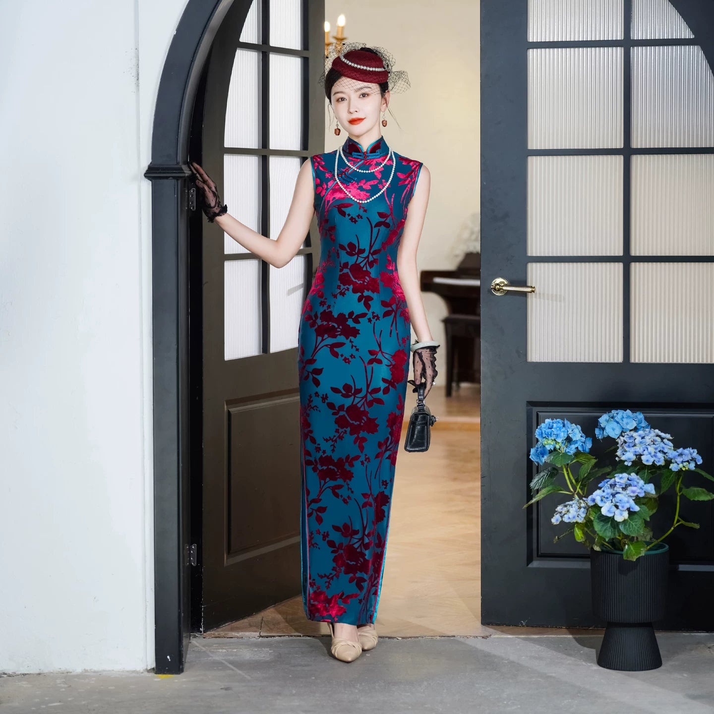 Modern velvet qipao gown with embroidery
