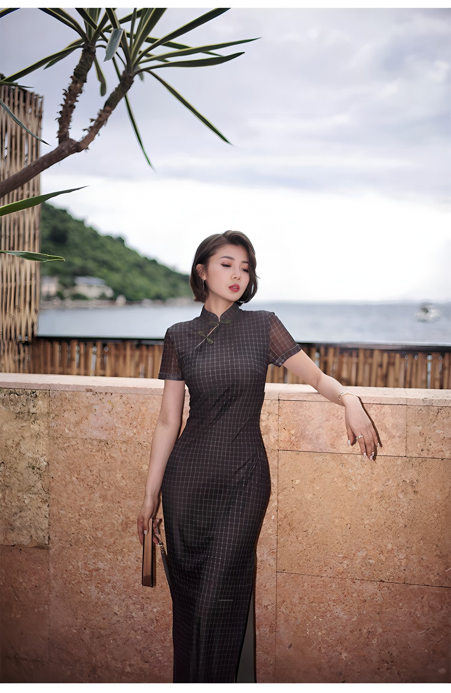 Modern qipao gown with a black plaid print.
