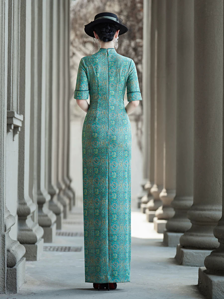 Tailoring a modern blue-green qipao gown for you.