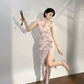 Modern qipao gown with a pink floral pattern
