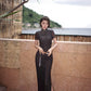 Modern qipao gown with a black plaid print.