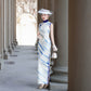 White sleeveless modern qipao gown