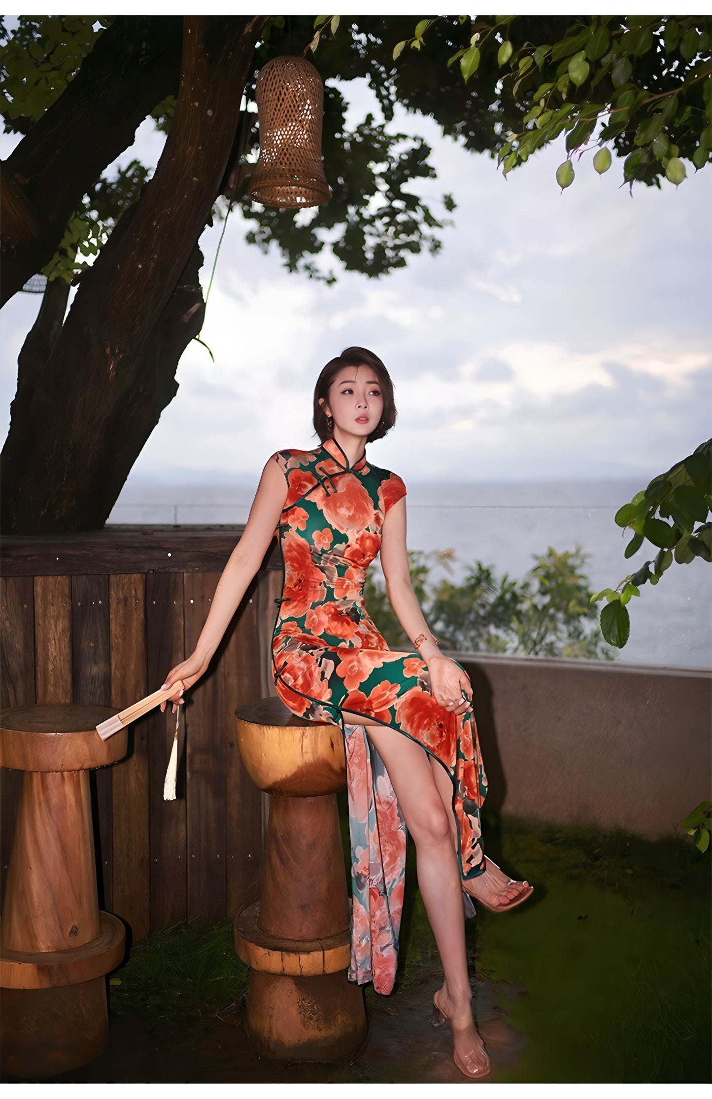 Modern qipao gown with red floral patterns