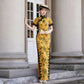 Yellow sleeveless modern qipao with a bamboo print.