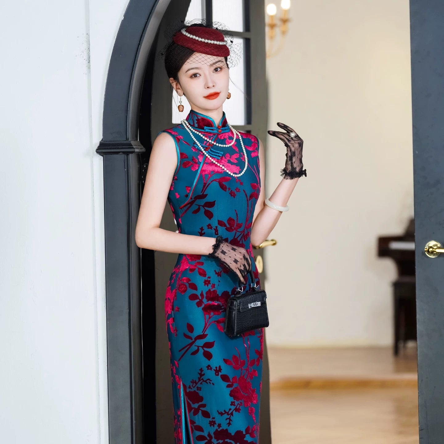Modern velvet qipao gown with embroidery