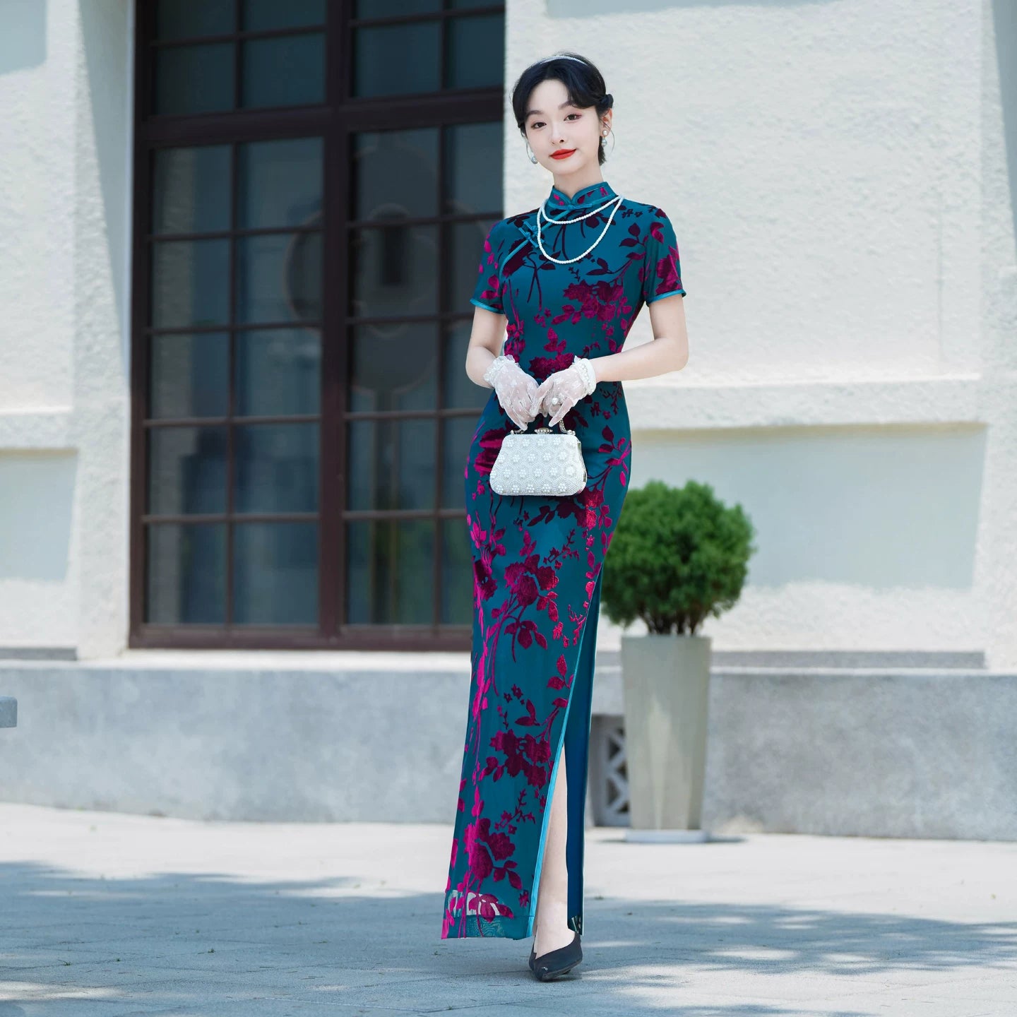 Modern velvet qipao gown with embroidery