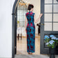 Modern velvet qipao gown with embroidery