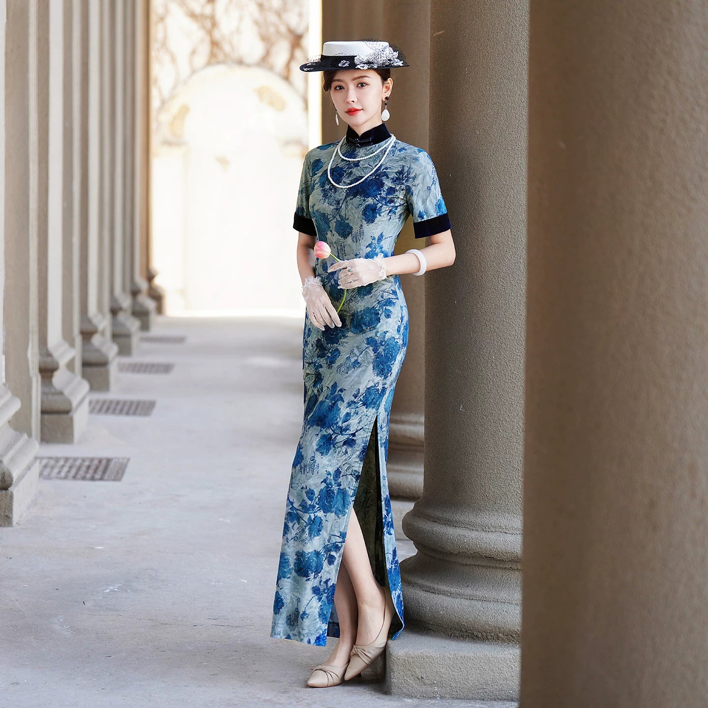 Modern qipao with a blue floral pattern