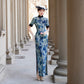 Modern qipao with a blue floral pattern