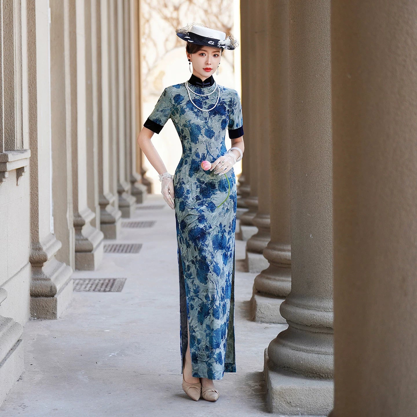 Modern qipao with a blue floral pattern