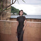 Modern qipao gown with a black plaid print.