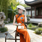 Orange sleeveless modern qipao gown