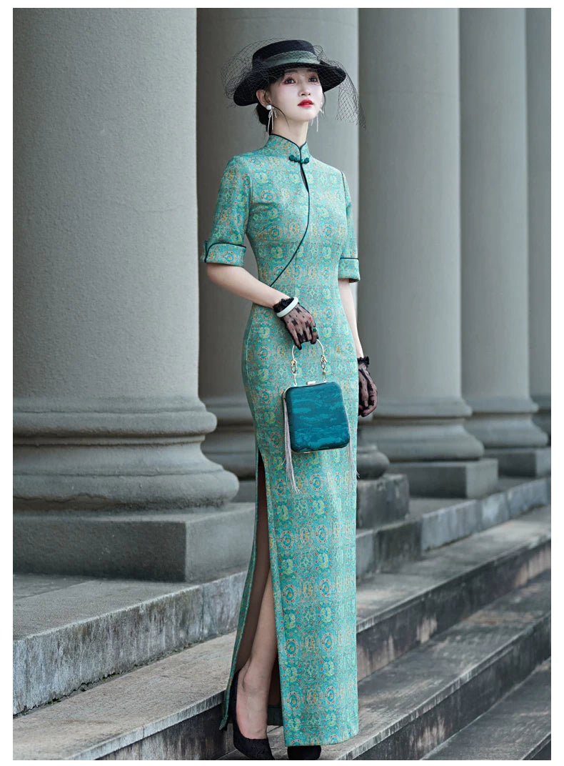 Tailoring a modern blue-green qipao gown for you.