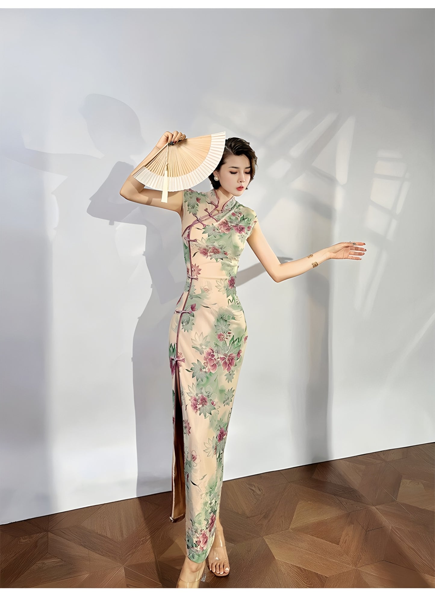 A cyan floral qipao gown for summer.