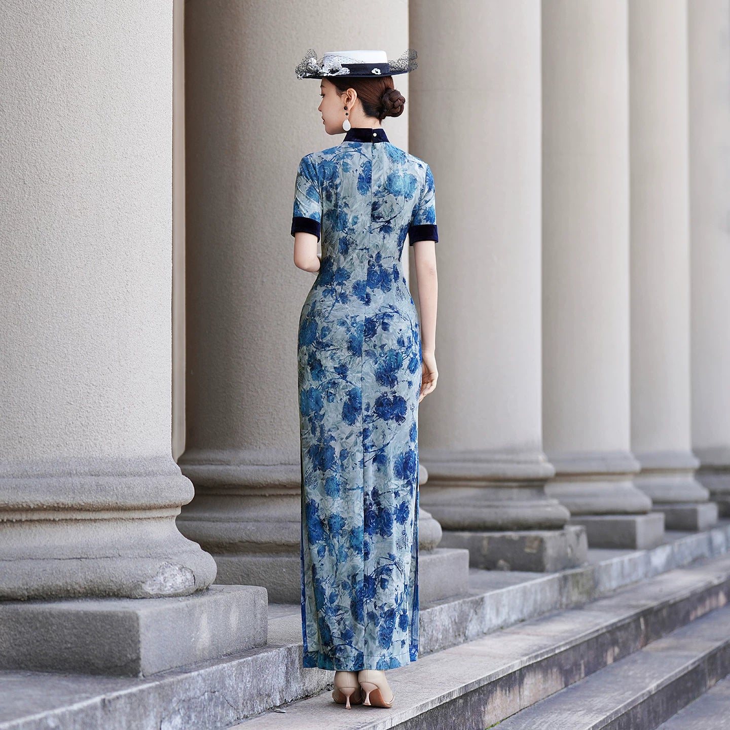 Modern qipao with a blue floral pattern