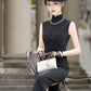 Black velvet sleeveless qipao gown