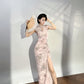 Modern qipao gown with a pink floral pattern