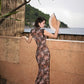 Brown floral qipao gown with lace trim
