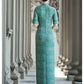 Tailoring a modern blue-green qipao gown for you.