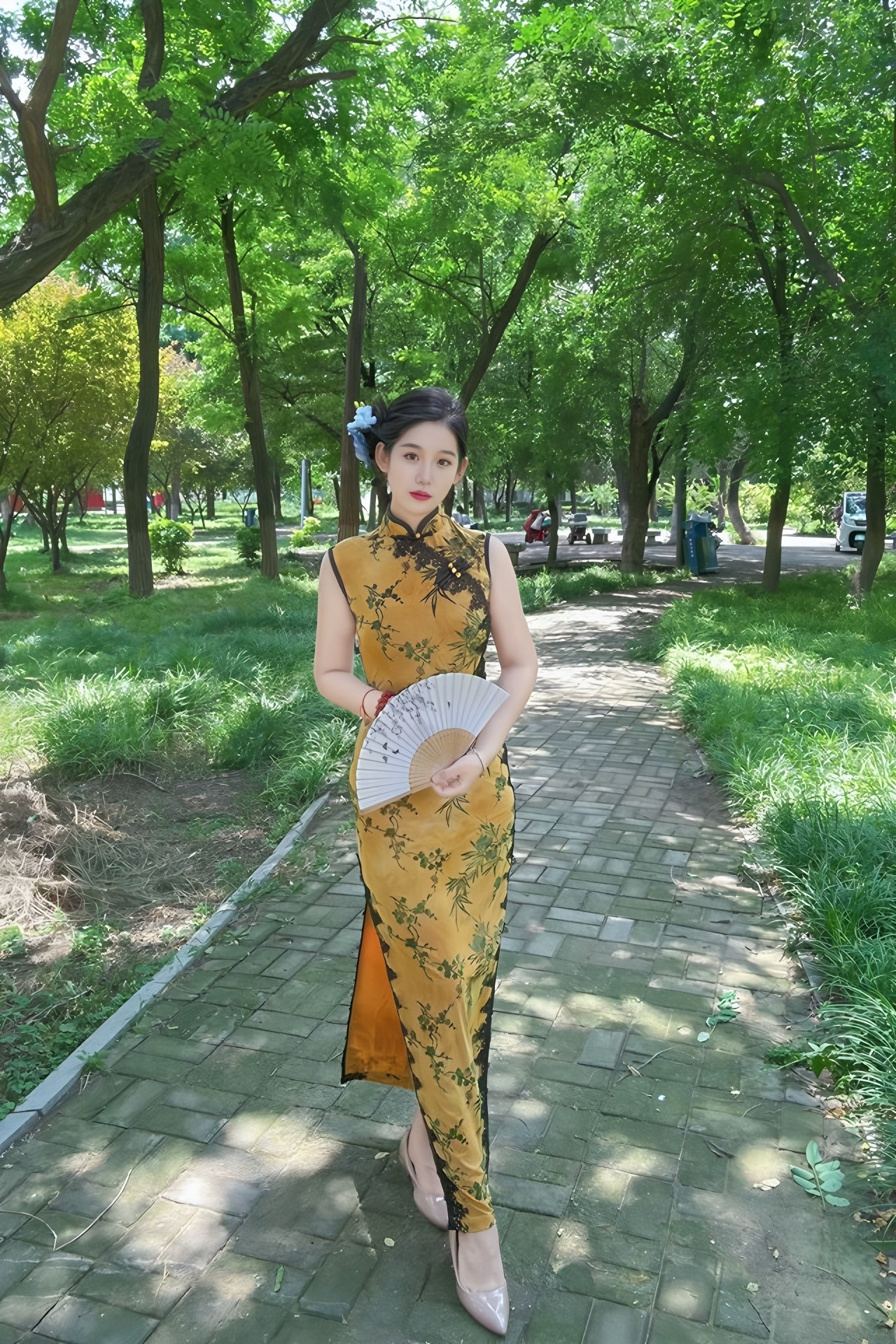Yellow sleeveless modern qipao with a bamboo print.