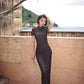 Modern qipao gown with a black plaid print.