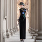 Sleeveless black velvet modern qipao featuring lotus embroidery.