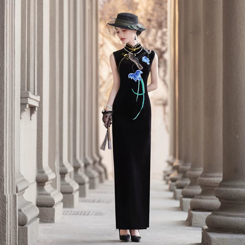 Sleeveless black velvet modern qipao featuring lotus embroidery.