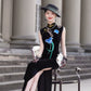 Sleeveless black velvet modern qipao featuring lotus embroidery.