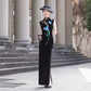 Sleeveless black velvet modern qipao featuring lotus embroidery.
