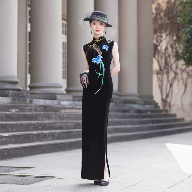 Sleeveless black velvet modern qipao featuring lotus embroidery.