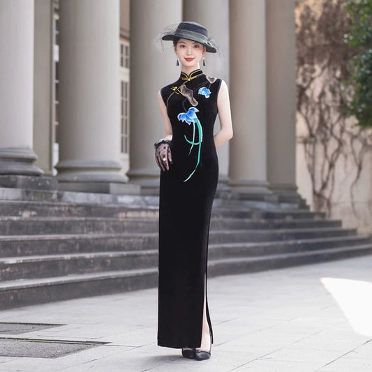 Sleeveless black velvet modern qipao featuring lotus embroidery.