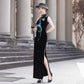 Sleeveless black velvet modern qipao featuring lotus embroidery.