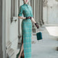 Tailoring a modern blue-green qipao gown for you.