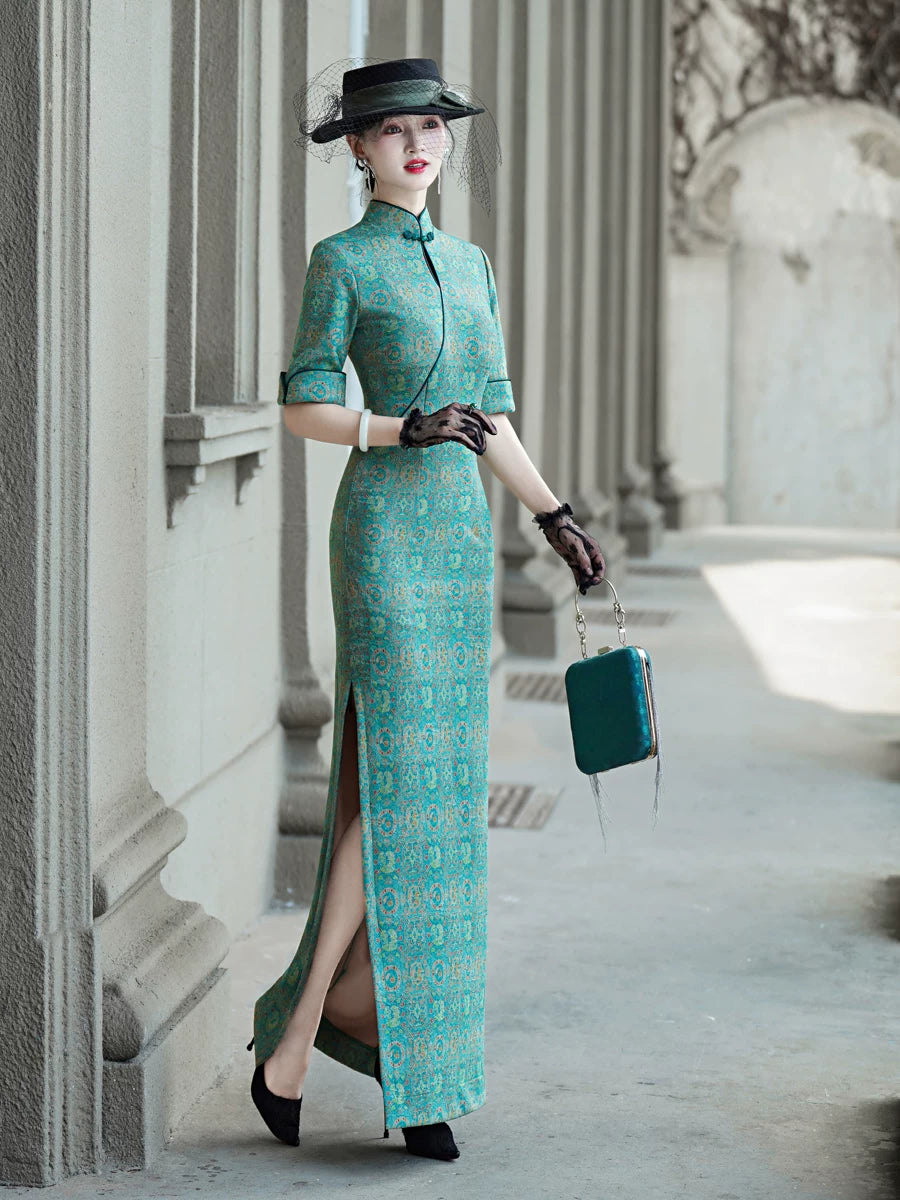 Tailoring a modern blue-green qipao gown for you.